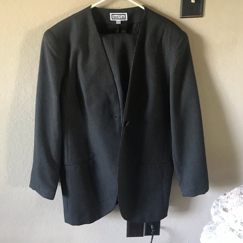 woman’s two piece skirt suit